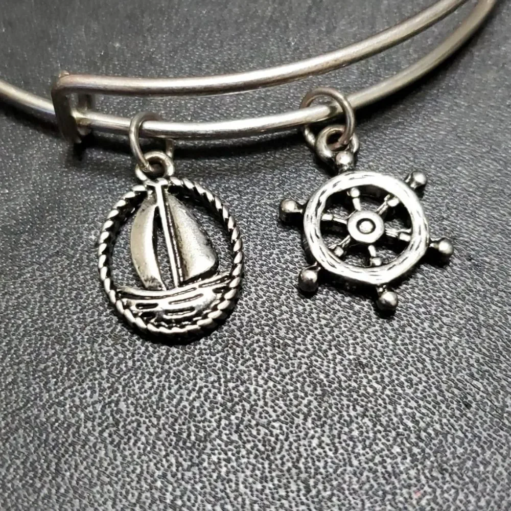 Silver tone sailing themed charm bangle bracelet 7.25